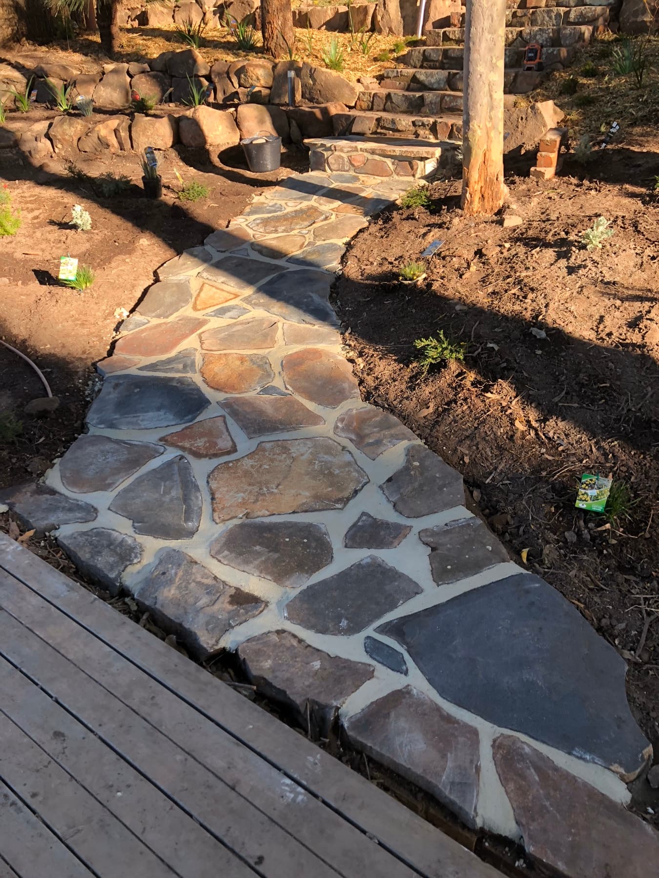 Crazy-paved flagstone area beside timber decking
